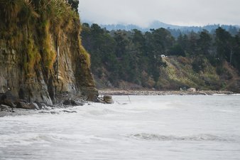 a person riding a surfboard on a wave in the ocean